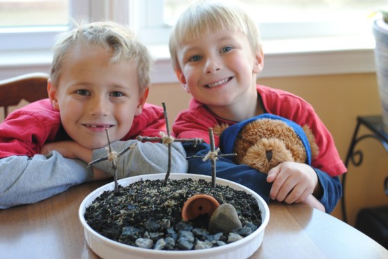 crosses on a hill with boys